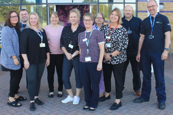 A picture of staff from a range of organisations offering advice and support regarding finance, housing, employment and wellbeing at the drop-in at Burntwood Library on Wednesday 22 July.