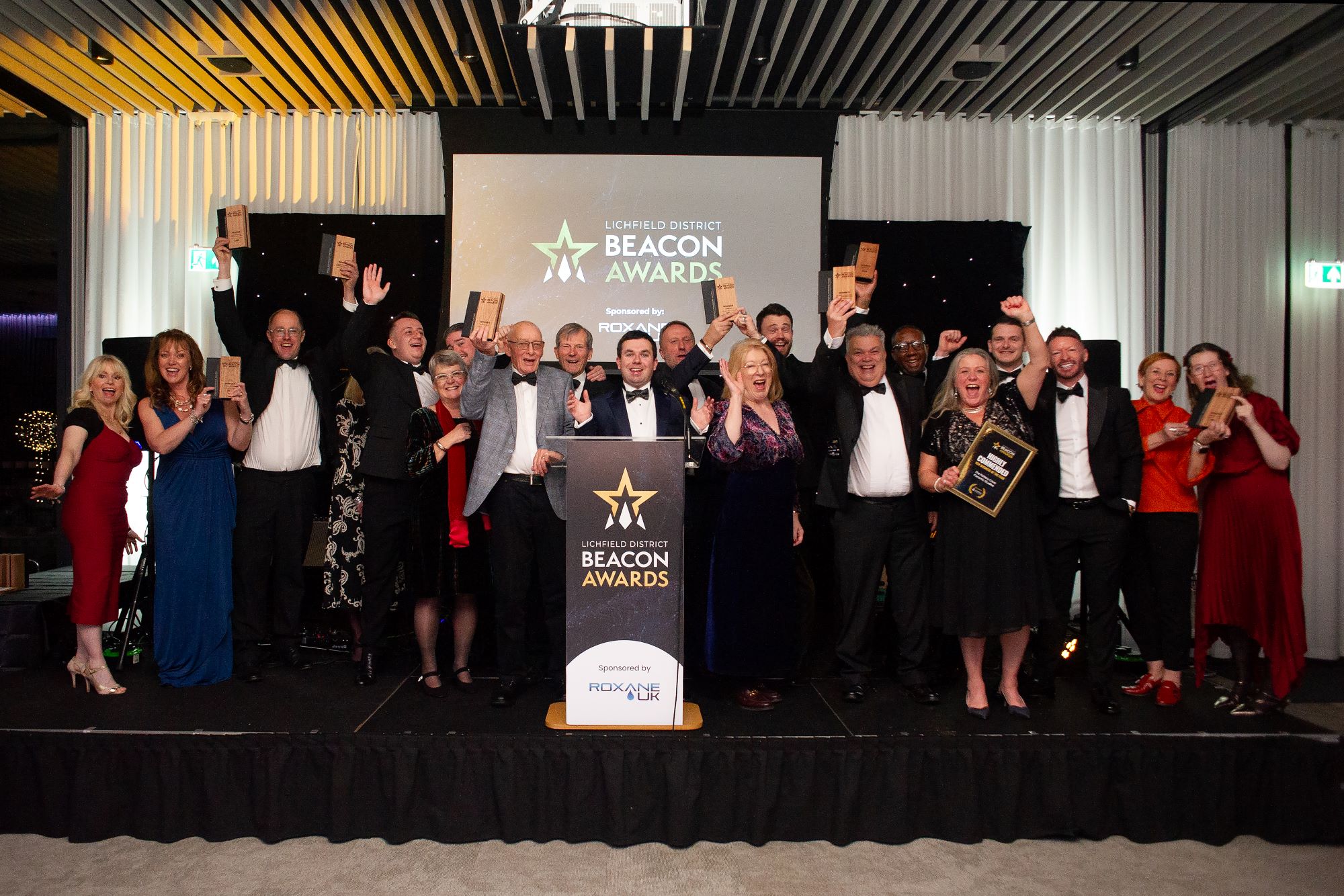 A picture of the Beacon Awards winners.