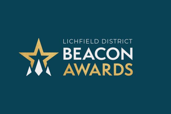 A picture of the Beacon Awards logo.
