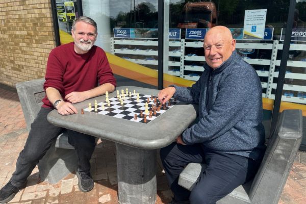 A picture of Councillor Darren Ennis (left) district ward councillor for Chasetown and Cllr Phil Whitehouse, Cabinet Member for Operational Services, Parks & Waste enjoying a game of chess.