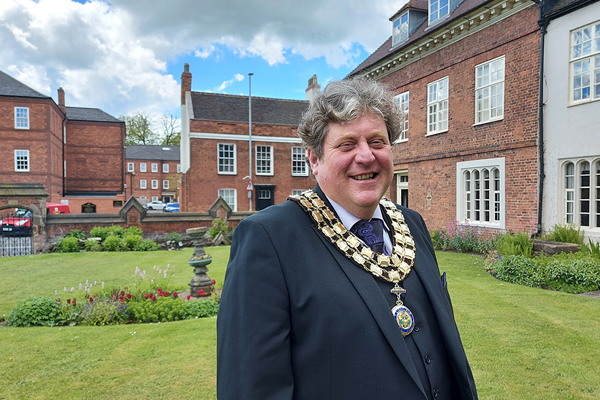 Barry in council garden wearing chairman's chains