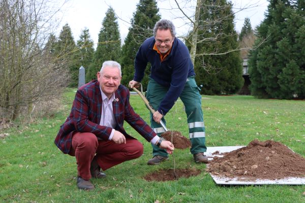 Paul Niven, Community Gardener at Lichfield District Council (right) and Andy Ansell, Head of Estates at the National Memorial Arboretum plant one of a pair of Battle of Verdun oak saplings at the NMA.(Copyright – National Memorial Arboretum)