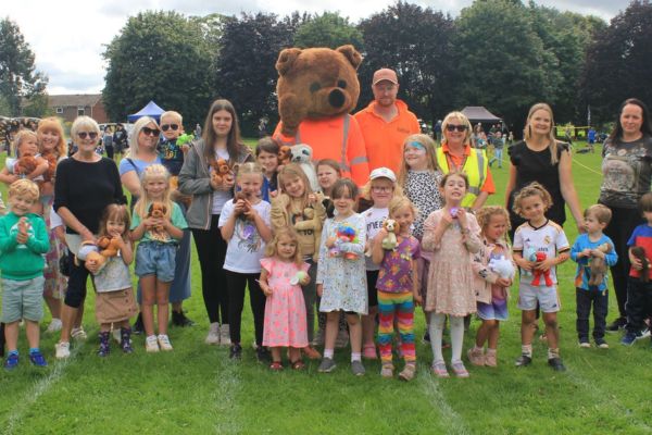 A picture of people having fun at Beacon Park Fun Day next taking place next Wednesday August 5.