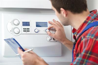 Man checking boiler