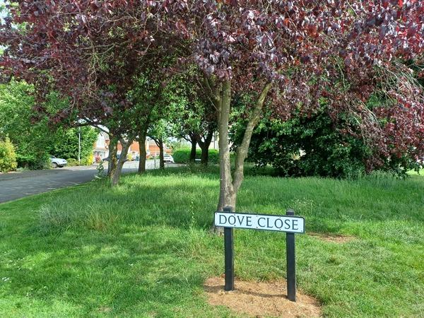 A road sign on the grass at Dove Close Habitat Haven