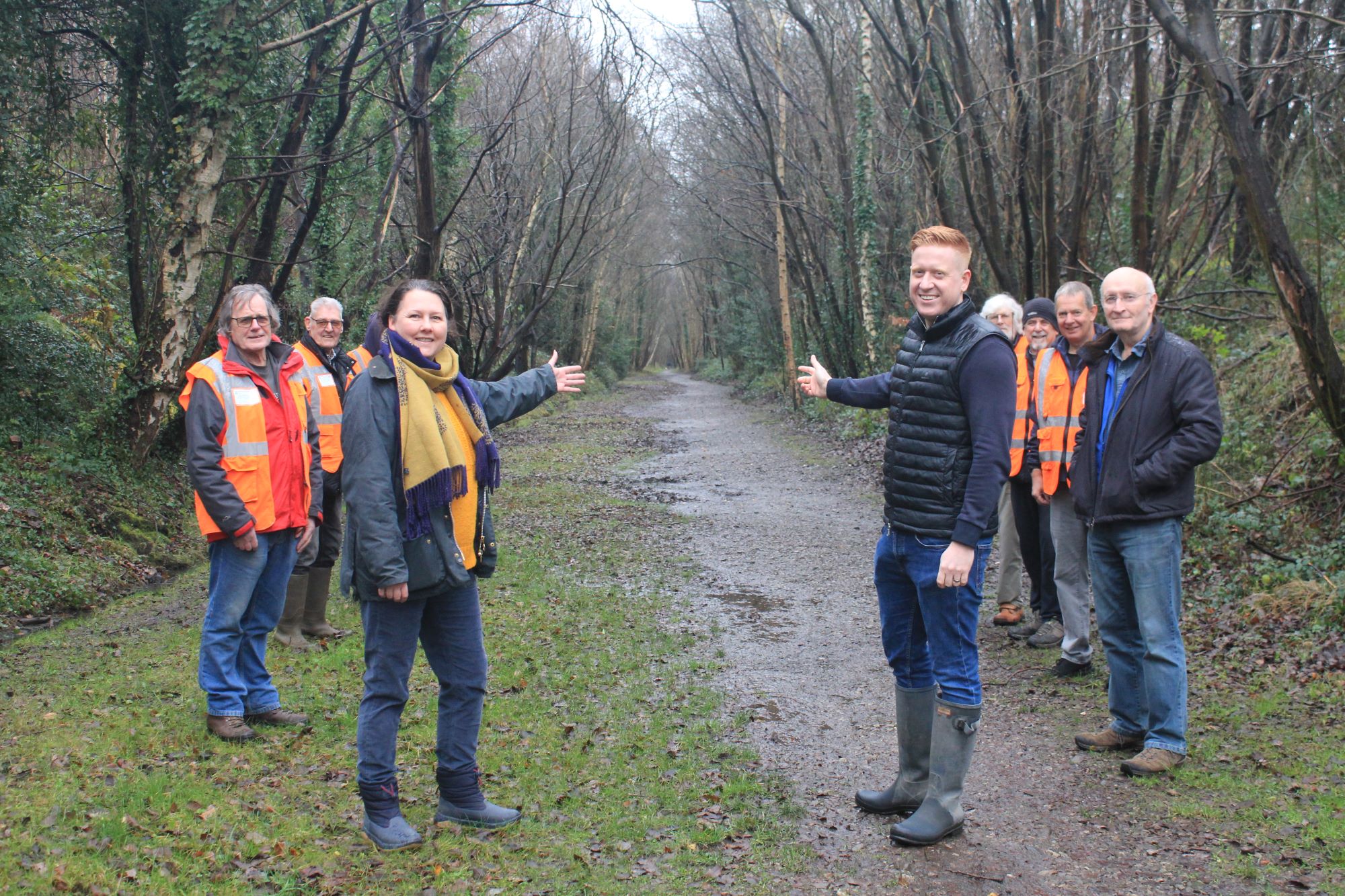 A picture of Lichfield District Council Leader Councillor Doug Pullen and Cabinet Member for High Streets and Visitor Economy Councillor Janice Silvester-Hall with members of Back the Track on The McClean Way at Brownhills.