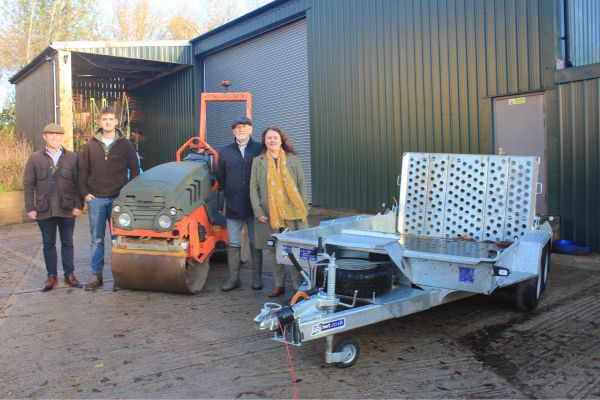 A picture of (from left) Councillor Richard Holland, Tom Smekss and Adrian Smekss of Hollywell Farm and Cllr Janice Silvester-Hall.