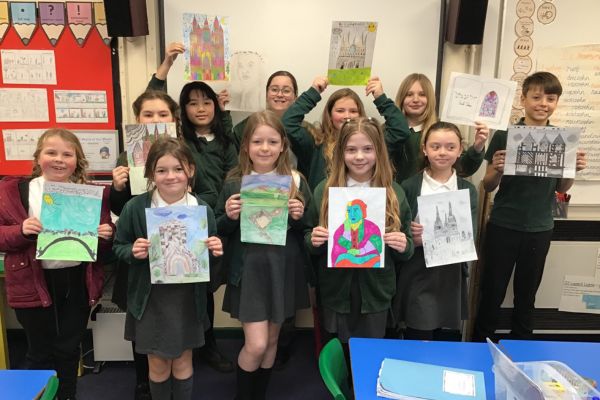 A picture of pupils from Holly Grove Primary School in Burntwood with their artwork.