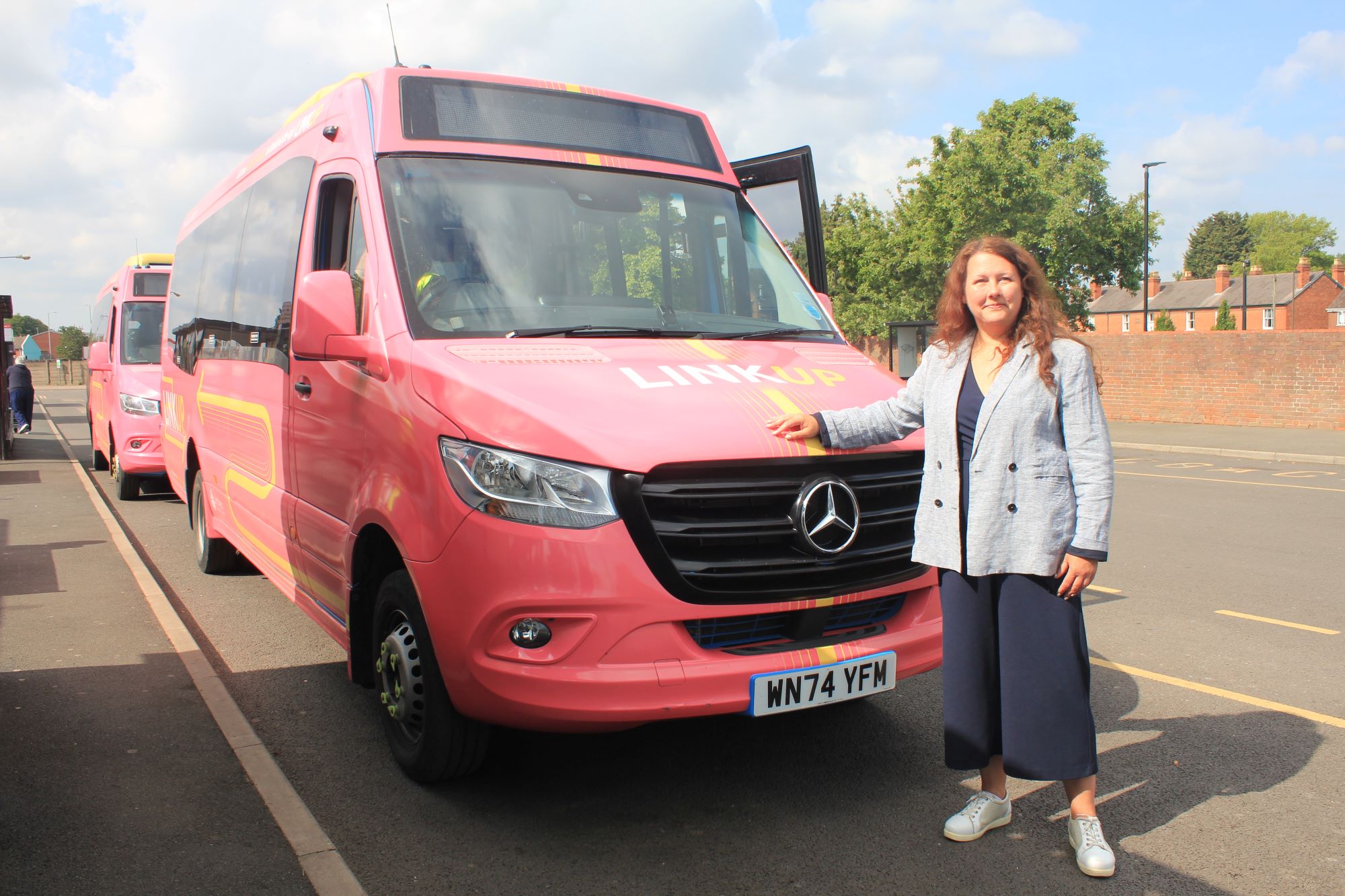 A picture of Councillor Janice Silvester-Hall, Cabinet Member for UKSPF at Lichfield District Council, with the LinkUp bus.