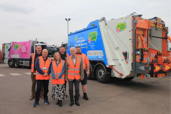 A picture of councillors, Phil Whitehouse and David Foster and staff, Darren Phillips, Vicki Woodhouse, Darren Rushton and Martin Hughes with two of the new vehicles.