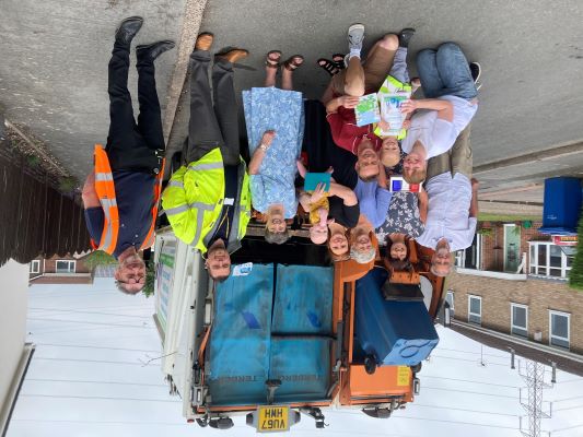 Jude Clarke with his family and Pete Wood and Darren Phillips of the Joint Waste Service.