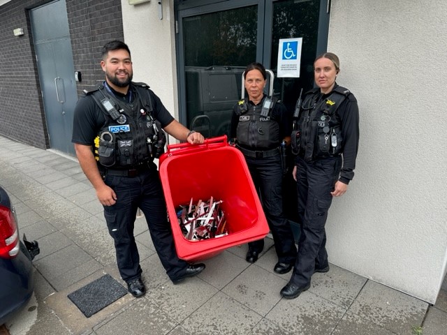 PCs Clayton-Tang, Harris and Ford are pictured with the blades collected in knife bins across the Lichfield District.