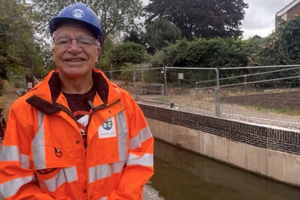 A picture of Derek Lord, Planning and Technical Trustee at Lichfield and Hatherton Canal Restoration Trust, at the Gallows Reach section of the canal.