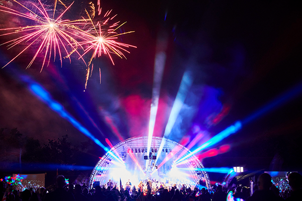 Proms stage with fireworks overhead