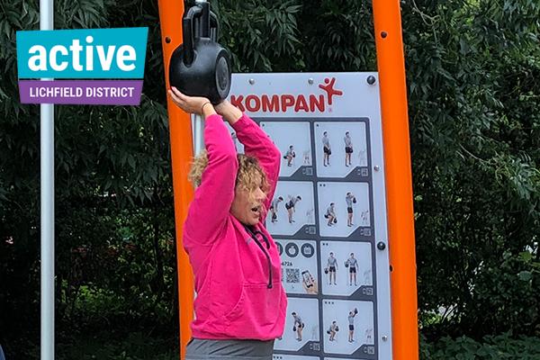 lady using exercise equipment