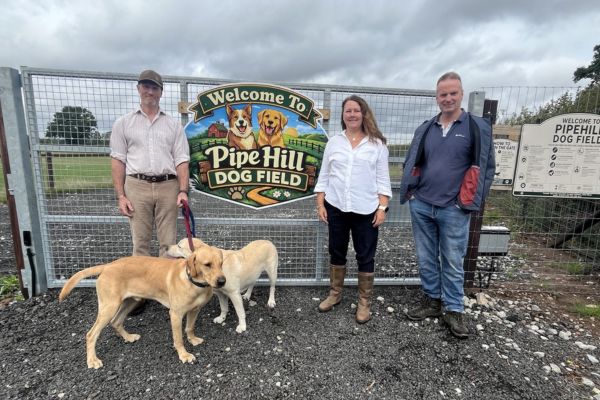 A picture at Pipehill Dog Field of proprietors Martin (left) and Andrew Hulme with Councillor Janice Silvester-Hall, Cabinet Member for Visitor Economy, Ecology & Climate Change.