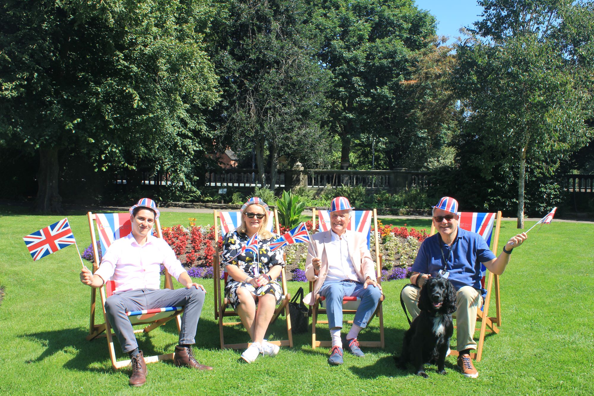 Looking forward to taking a seat at this year’s Lichfield Proms in Beacon Park are (from left) In-Form Solutions data Analyst Ben Griffiths, Business Manager Dawn Bond, Chairman David Poynton and Managing Director John Griffiths with Archie.