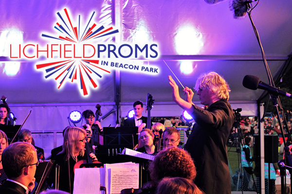 proms musicians and conductor on stage
