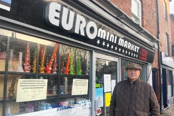 A picture of Councillor Richard Cox, Lichfield District Council’s Cabinet Member for Community and Public Protection, outside the closed Euro Mini Market on St John Street, Lichfield.