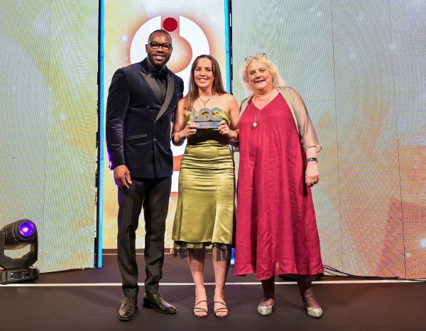 Lichfield District Council’s Ecology and Climate Change Manager Kristie Charlesworth (centre) receives the LGC Awards 2023 Rising Star Award.