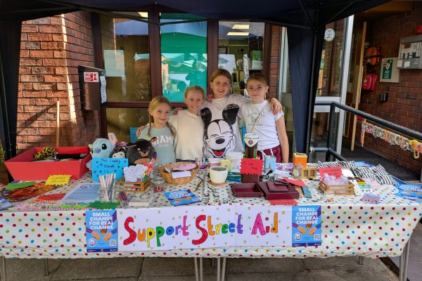 A picture of the girls on their fundraising stall (from left) Polly, Mia, Cailin and Annie.