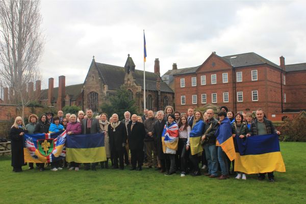 A picture of Ukrainian people living in Lichfield District gathered with district councillors, council staff and supporters for a special flag raising ceremony to mark the fourth anniversary of the Russian invasion.