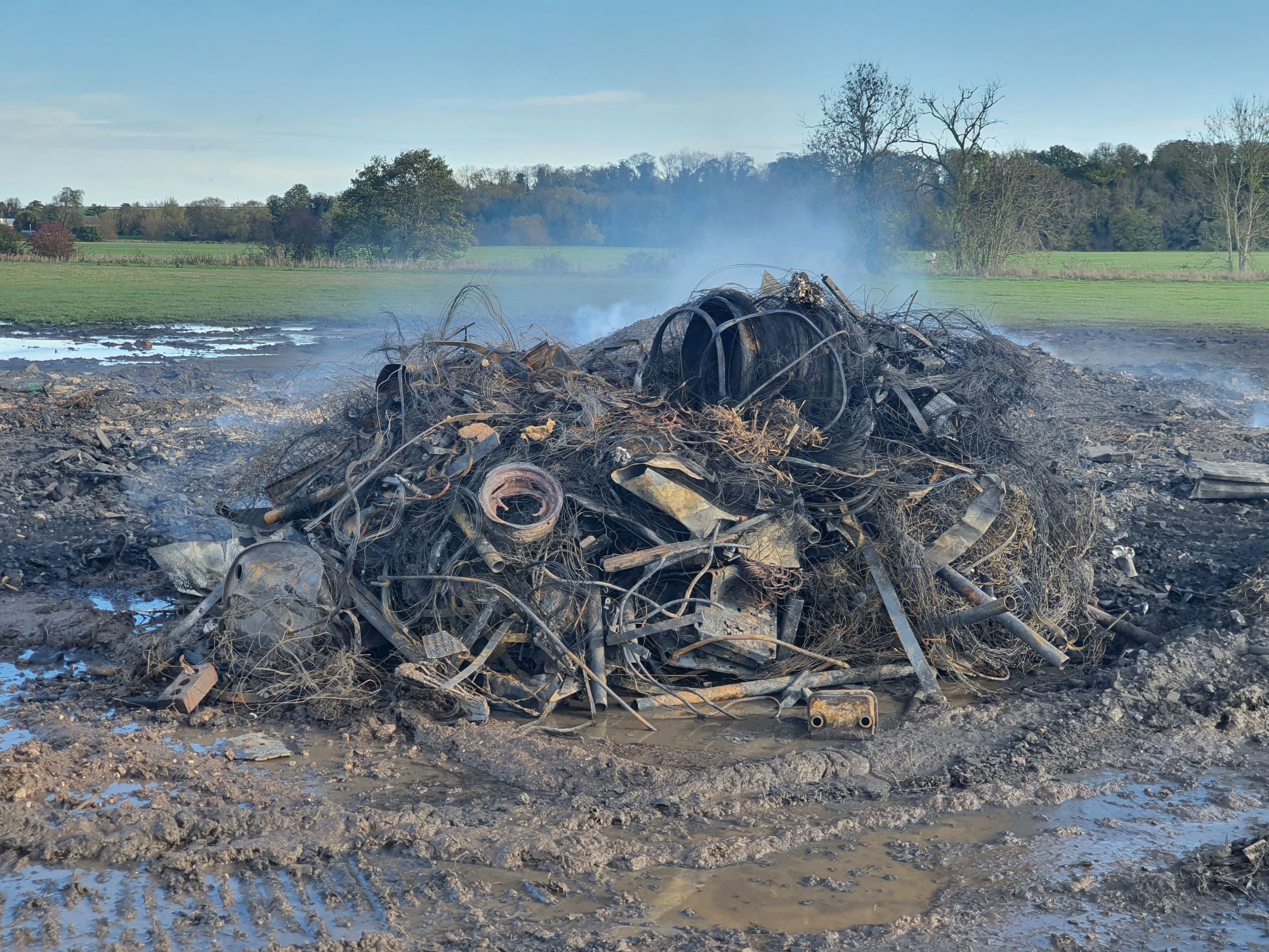 A photo of the smouldering waste found by environmental health officers on 8 November 2022.