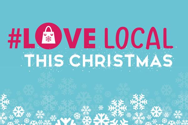 snowflake illustrations with Love Local This Christms wording