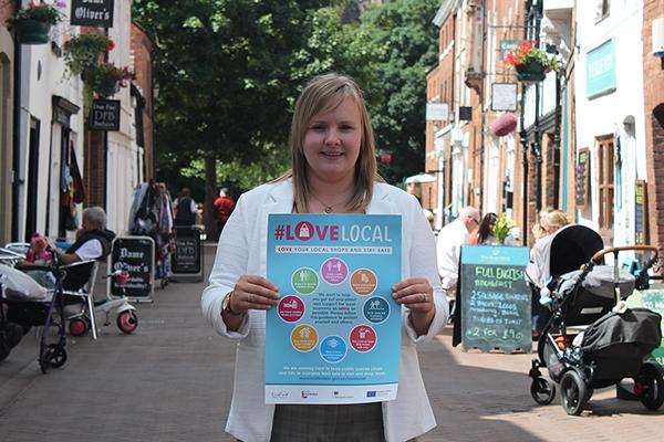 image of Tasmin holding poster in Lichfield street
