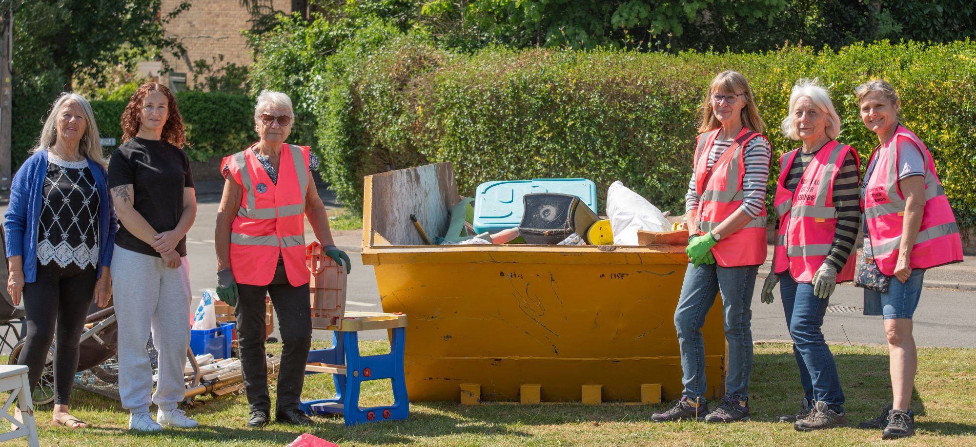 A picture of volunteers who filled a skip at Saturday’s ‘Be Proud Of Your Community’ Day.