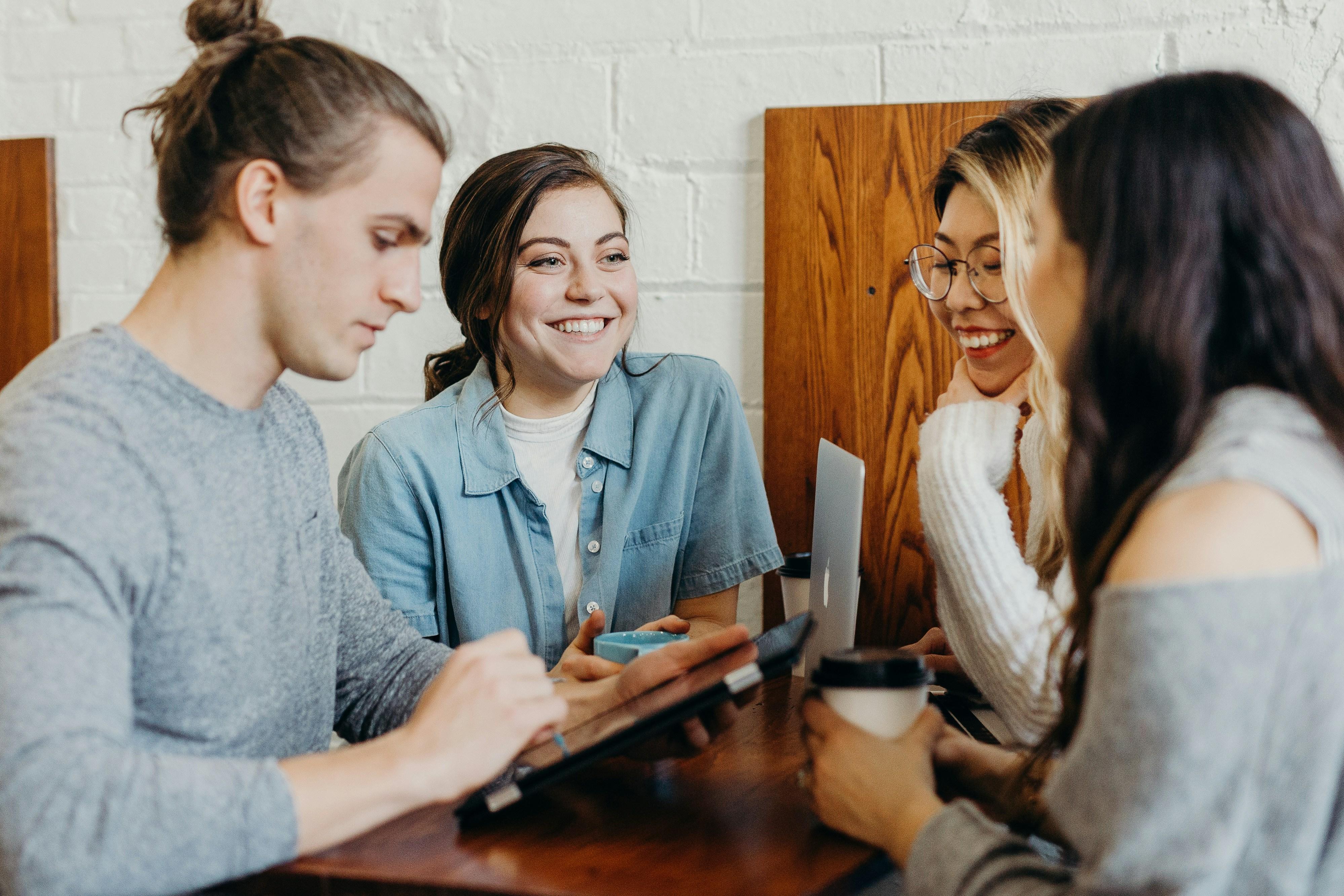 People talking tablet engagement session unsplash