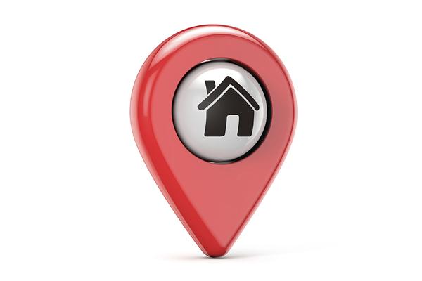 red pin with house in the middle