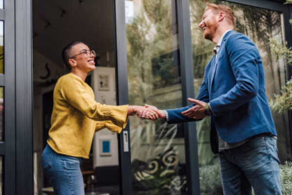 Two people shaking hands