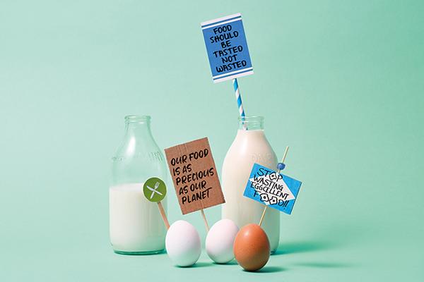 dairy products with signs that say don't waste