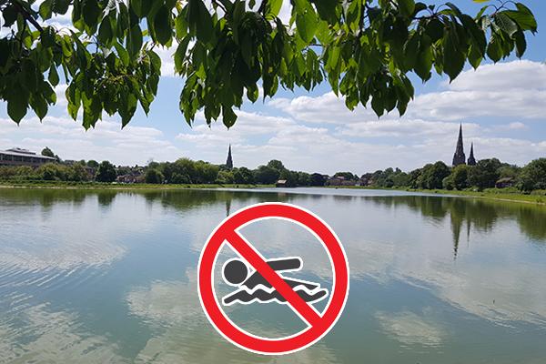 Stowe Pool with sign over the top of the water showing no swimming