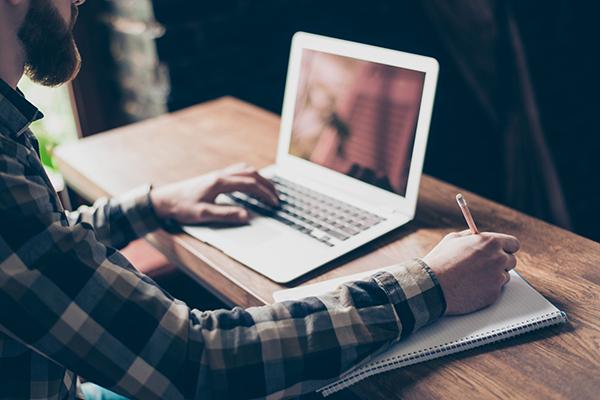 man working at a laptop