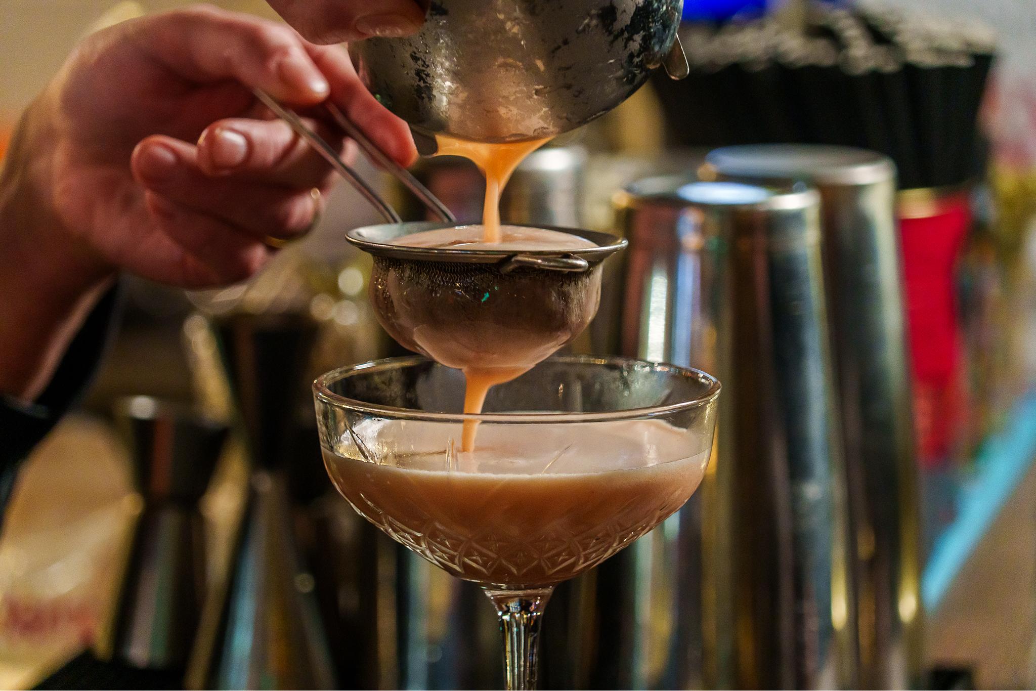 Pouring of cocktail within Lichfield&#039;s nightlife
